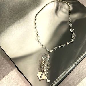 Silver necklace with Lock and Key pendant.